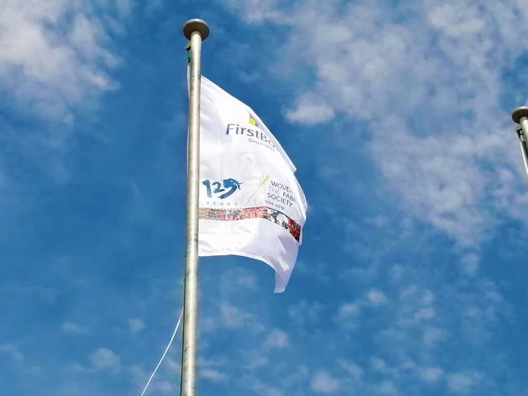 Flying high FirstBank anniversary flag